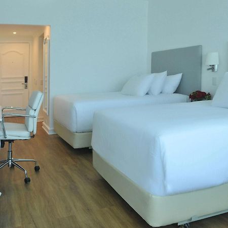 ホテル Nh コレクション プラザ サンティアゴ エクステリア 写真 A room at the hotel